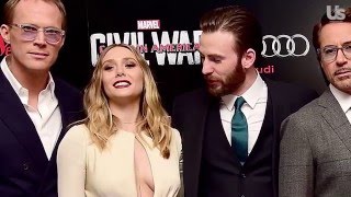 Chris Evans Can't Stop Staring at Elizabeth Olsen's Red Carpet Cleavage