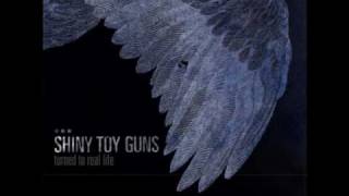 Shiny Toy Guns - Turned To Real Life