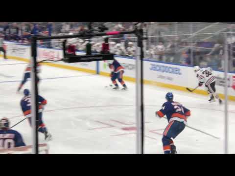 Riley Stillman Roughing on Cal Clutterbuck December 5 2021 Blackhawks at Islanders UBS Arena