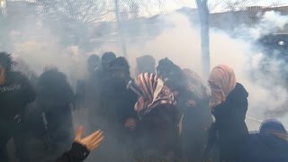 Anti-Erdogan newspaper defiant, police disperse protesters
