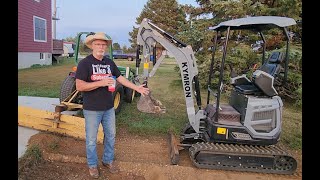 Kymron XH20D Mini-Excavator:  Getting Grass out of the Gravel.