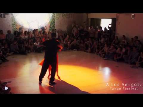  Mariano Frumboli  and  Juana Sepulveda  are  dancing  to  "  Ficha de oro  "  by  Aníbal Troilo  at  A los amigos tango festival  in  2015
