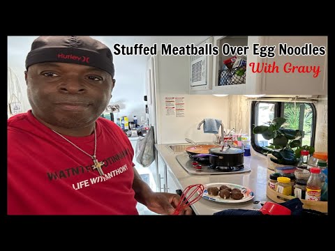 Delicious Stuffed Meatballs with Brown Gravy and Egg Noodles