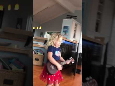 Ukulele playing girl