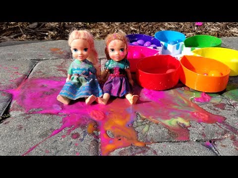 Paintballs ! Elsa and Anna toddlers playing with colors - water fun - splash