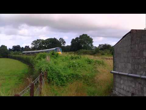 IR 22000 Class DMU Passes on the Dublin - Kilkenny Line Past Lavistown Level Crossing