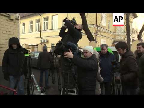 Three suspects in acid attack on Bolshoi art director Sergei Filin arrive at court