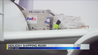 Last-minute holiday shipments keeping FedEx busy