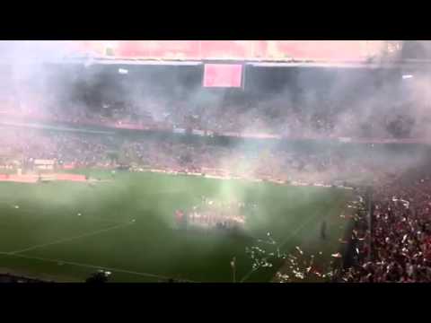 Red and white fire works and confetti for Ajax, today