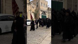 Christian procession on the street of the Old City in Jerusalem, Israel, 2024.