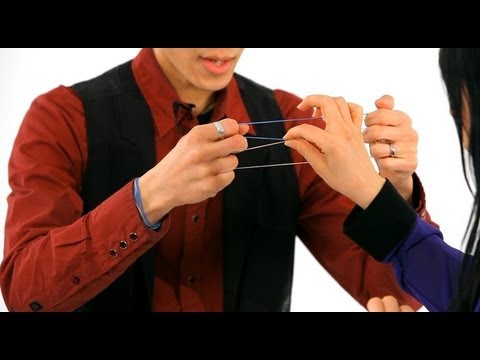 How to Do the Linking Rubber Band Trick | Magic Tricks