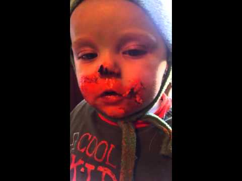 Lennon eating his first Birthday cake.