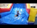 Little Girl Kid On Big Bouncy Slide At Kids Gym Carolina Gymnastics Academy