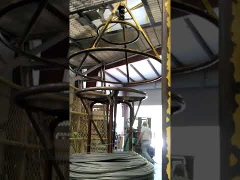 wire rewinding payoff for coiling and strapping