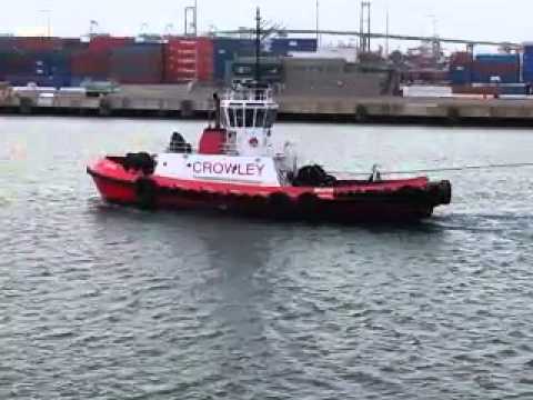 Tug Boat towing Massive ship