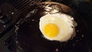 Sticking Test - Cooking eggs on the bottom of my 1890s Wagner cast iron skillet.