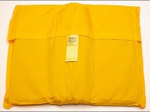 AvSax lithium battery fire mitigation bag containing an exploding battery charger