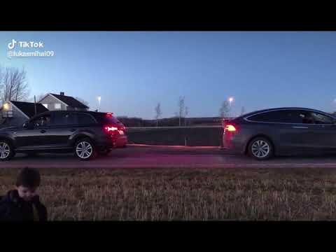 Audi q7 vs  Tesla X