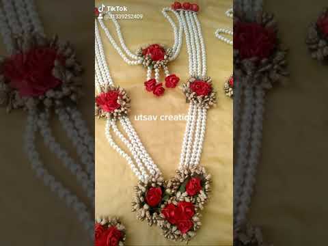 Red artificial flower jewellery