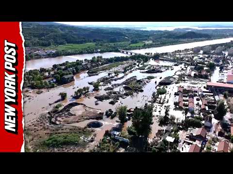 Beijing floods shatter bridge, bury villages in mud after record rainfall