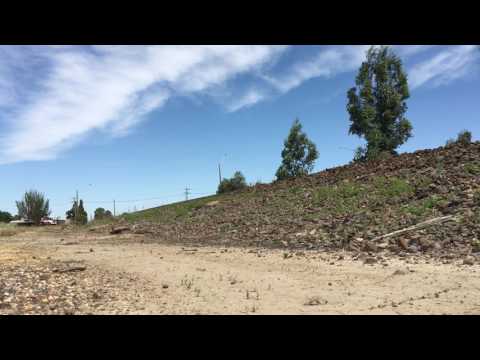Empty grain hoppers pass through Ararat with BL27 leading