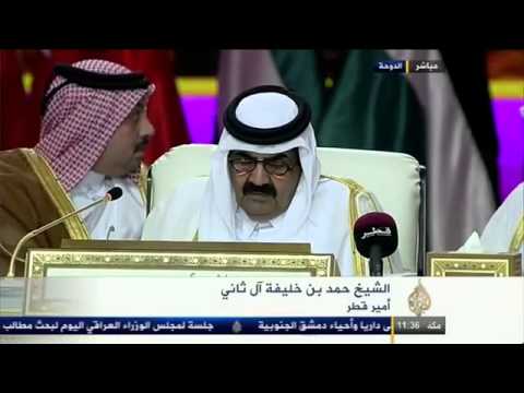 لحظة دخول الشيخ معاذ الخطيب رئيس الائتلاف والسيد غسان هيتو رئيس الحكومة المؤقتة المكلف إلى قاعة اجتماع القمة العربية في الدوحة...