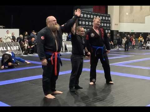 Ultra Heavyweight Blue Belt Gi Final Match Masters 2 Competitor Beats Adult Opponent With Submission