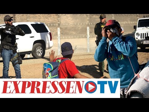 Här stormar mexikanska migranterna mot USA:s gräns