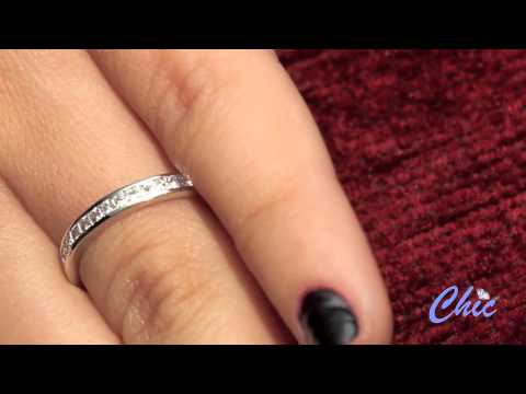 Eternity band with high quality AAA princess cut cubic zirconias in platinum setting. Item # P5549