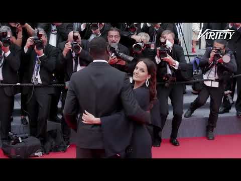 Omar Sy brings wife Hélène Sy onto the red carpet at the Top Gun Maverick premiere at Cannes