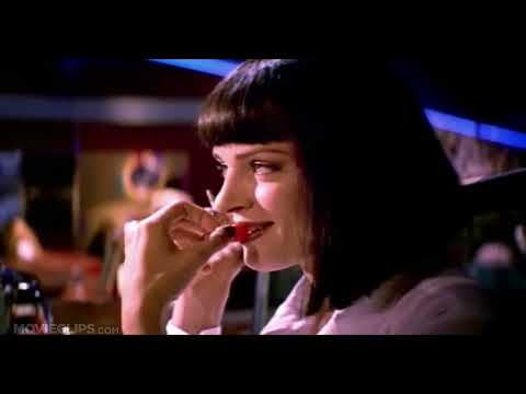 Pulp Fiction trailer frame with Vincent Vega and Jules Winnfield walking in suits