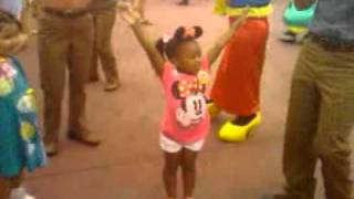Mikayla doing the hokey pokey @Disney World