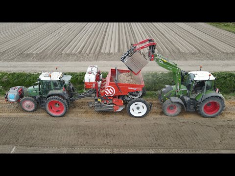 Potato planting - Fendt 415 with Dewulf/ Miedema Structural 4000 all in one belt planter