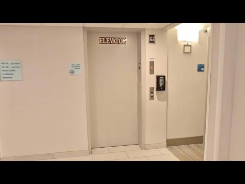 Mahwah,NJ: Steps and Dover hydraulic Elevator at Holiday Inn Express with a look at a room