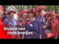 Even Prinsjesdag op Tilburgs station, invasie van 110 dames met rode hoedjes