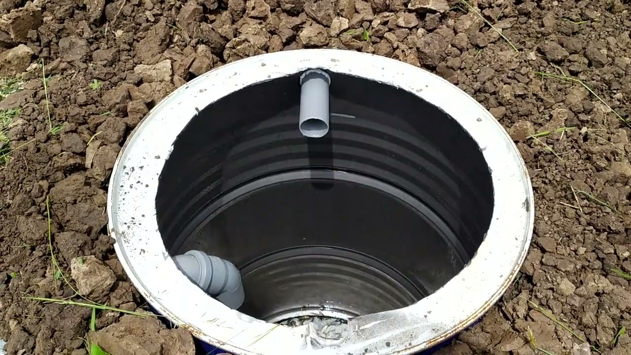 выгребная яма из пластиковой бочки без дна