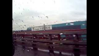 Заезжаем с Софийской на КАД СПб, вид на Неву и Вантовый мост из пассажирского окна, дождь, весна, ве фото