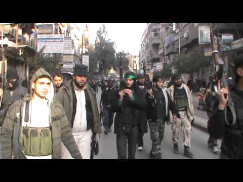 مظاهرة لعناصر كتيبة صقور الجولان بعد السيطرى على مخيم اليرموك في مدينة دمشق ضمن معركة "تحرير مخيم اليرموك"