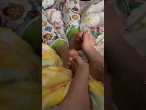 Sisters playing footsies 6