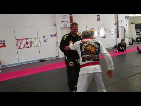 Professor Carlos and Grand Master Hilton Leão Red belt