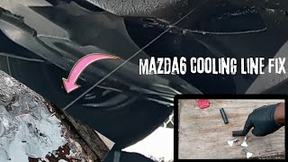 Mazda6 transmission cooling line leak quick fix using hose clamp