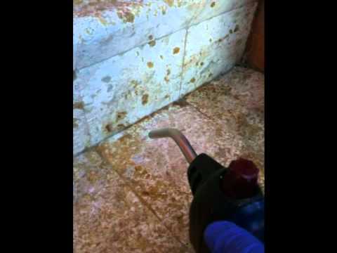 Removing mineal/oil base stains on stone