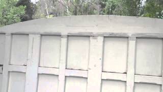 Wood gates with wood panels. Not the way to go.