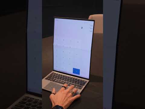 Video Thumbnail: Lenovo’s concept adds light-up buttons to a trackpad for shortcuts—brightness, playback, and more.