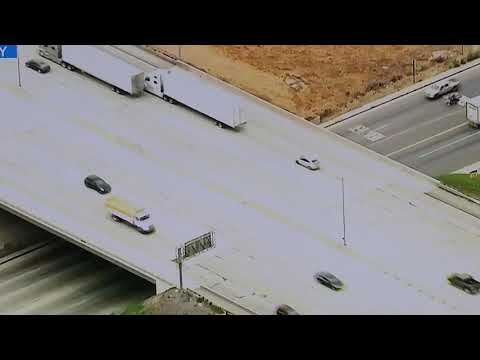 News helicopter starts following the wrong car in a pursuit.