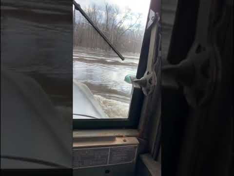 Deuce and a half M35A2 crossing some deep water in Iowa.