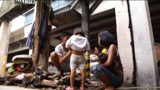 Harsh realities in the lives of Manila's migrants | Motorcycle Diaries