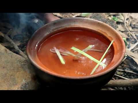 Survival skills: Snake fish soup in the clay for food - Cooking snake fish eating delicious Video