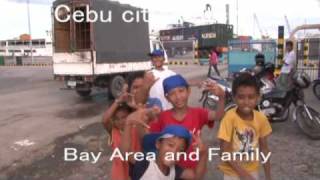 preview picture of video 'Cebu city Watching Bay area and family 港湾地域と子供をズームイン'