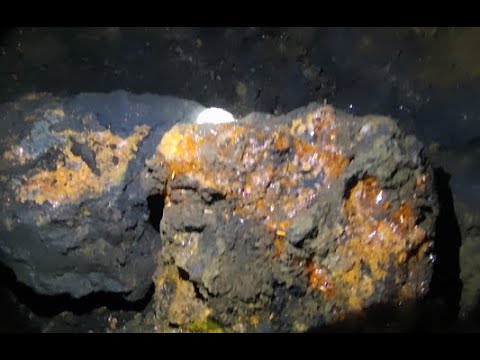 Inspecting raw crocoite from the Galena Hole at the back of the Red Lead mine
